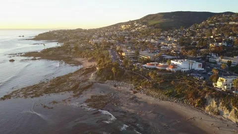 Laguna Beach Drone View with Vibrant Sunset Over the Ocean Stock Footage 300850293