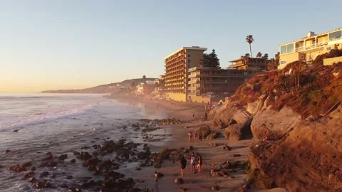 Laguna beach at sunset with people Stock Footage 154659906
