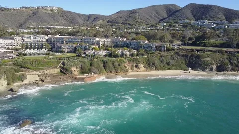 Laguna Beach Waves Rolling Over Rocky Shoreline Video stock 300850227