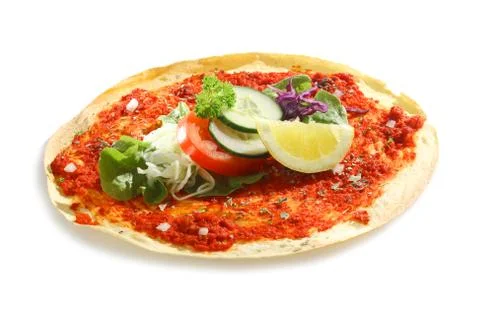 Lahmacun with tomato paste and fresh salad Stock Photos