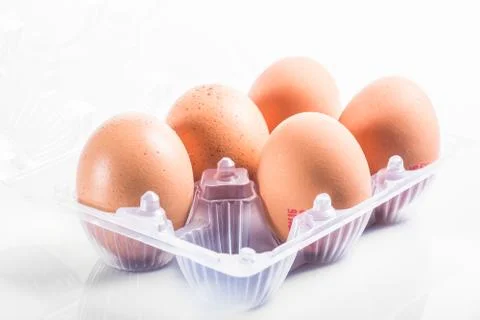 Laid eggs on white background Stock Photos