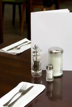 Laid table of a fine dining restaurant Stock Photos