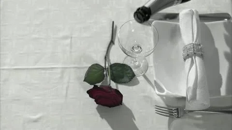 A laid table with a red rose Stock Footage 11300012
