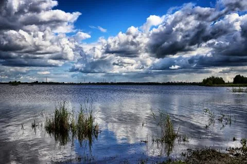 Lake and clouds Stock Photos