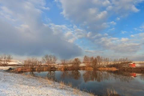 Lake and clouds in winter Stock Photos