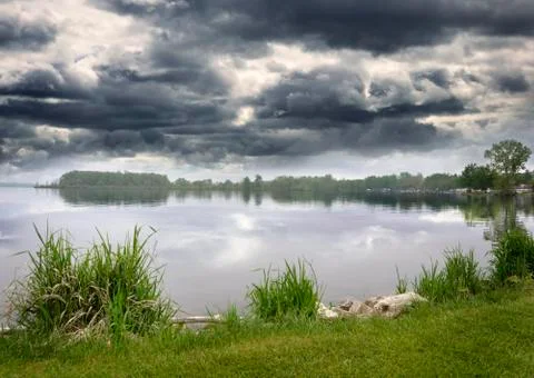 Lake and dramatic sky Stock Photos
