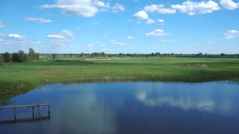 Lake and fields view from the top timelapse 库存影片 123666251