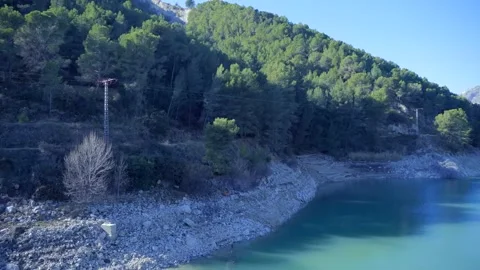 A lake and forest with mountains Video stock 147927510