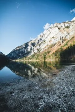 Lake and mountain with reflection during autumn in austria Stock Photos