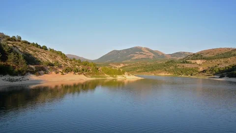 Lake and mountain at sunset Stock Footage 79546965