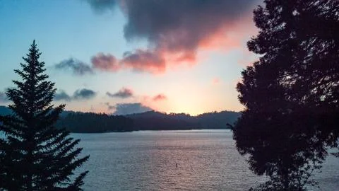 Lake Arrowhead Sunset Through The Trees Stock Photos
