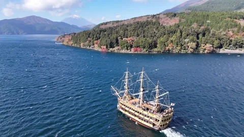 Lake Ashi Pirate Ship | Mt. Fuji View | Hakone - 4K Aerial Video Stock Footage 329054486