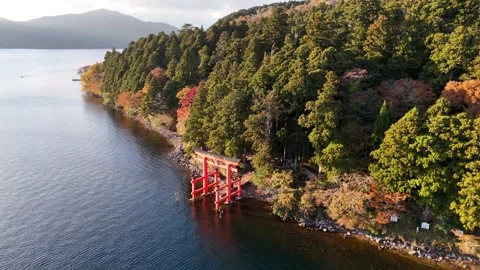 Lake Ashi | Torii Gate | Copy Space | Autumn - 4K Aerial Video Stock Footage 329054764