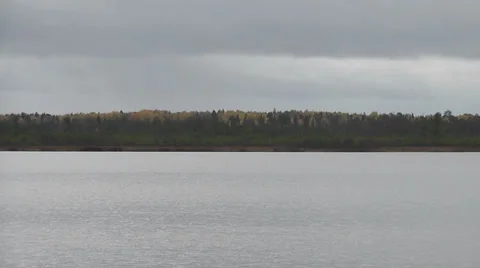Lake on the background of the autumn forest Stock Footage 28585559