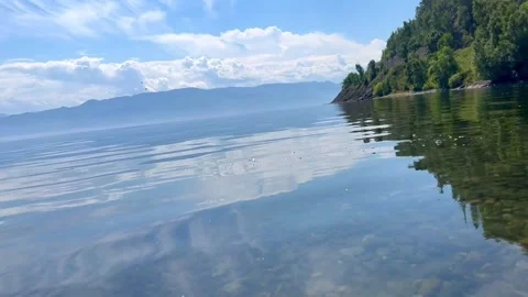 Lake Baikal. The camera moves on the surface of the water Stock Footage 253890945