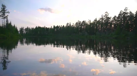 Lake Baikal glide over the surface of an ideal water at sunset Stock Footage 31933555
