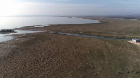 Lake beach. The lake also has birds. Stock Footage 122152953