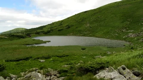Lake between mountains Stock Footage 68818628