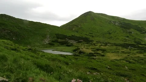 Lake between mountains at high altitude Stock Footage 68818630