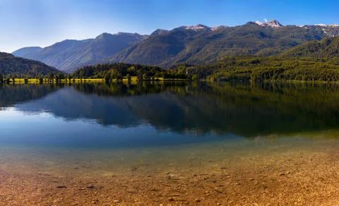Lake between mountains Stock Photos