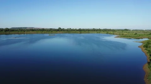 Lake between the trees. 스톡 동영상 111976308
