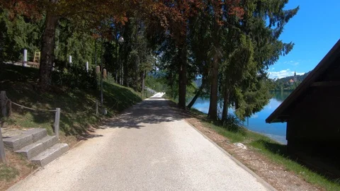 Lake Bled empty promenade asphalt road, Slovenia Stock Footage 129697265