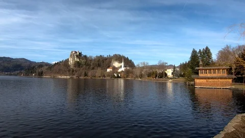Lake Bled water reflection with catholic church and castle in Slovenia Stock Footage 123168366