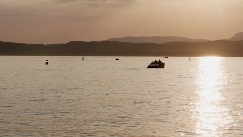 A lake with boats during the sunset Stock Footage 255690318