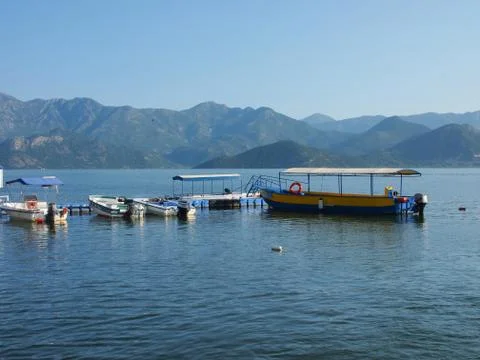 Lake with boats Stock Photos