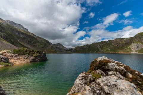 Lake, clouds and rocks with text space Foto stock