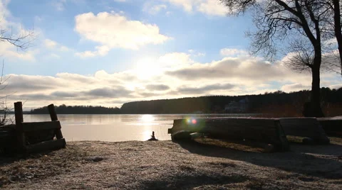 Lake, clouds float across the sky, the sun's rays. Stock Footage 60213567