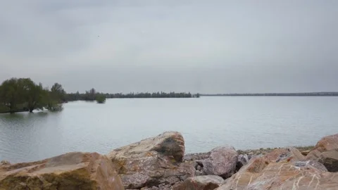 Lake in cloudy weather Video stock 238396270