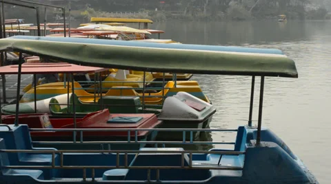 On the lake, colored boat Stock Footage 35533178