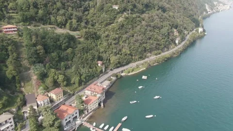 Lake Como aerial view high shot of harbour and blue lake - Italy Stock Footage 282977651