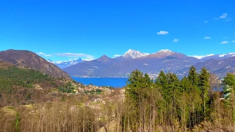 Lake Como and Snow-capped Mountain Stock Footage 111324096