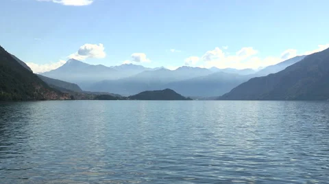 The Lake Como and the surrounding Alps Stock Footage 59573732