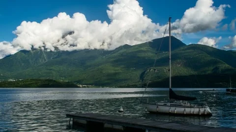 Lake Como with Boat and Clouds Timelapse Video stock 64182377