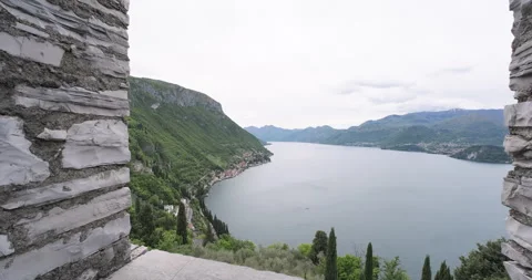 Lake Como on a cloudy day, Italy, view from Castello di Vezio tower. Vacations Stock Footage 286784132