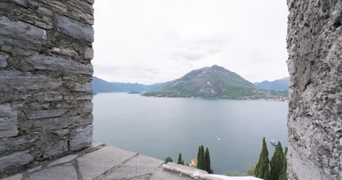 Lake Como on a cloudy day, Italy, view from Castello di Vezio tower. Travel Stock Footage 287626300