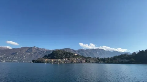 Lake Como Mountain View from Boat on a Sunny Winter Morning Stock Footage 314822924