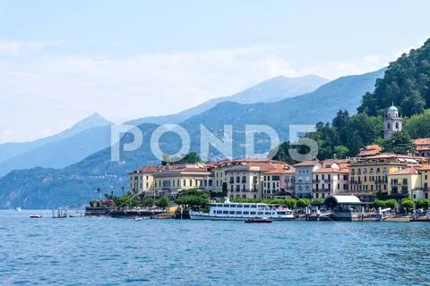Lake Como with mountains and buildings Stock Photos