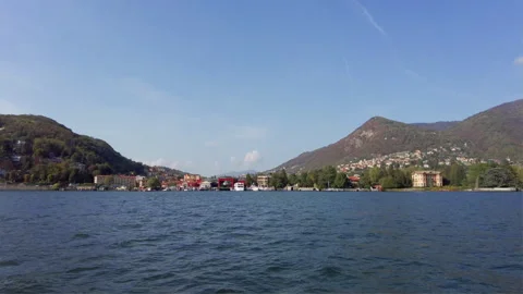 Lake Como shore, taking the shot from ferryboat near Como port. Stock Footage 255878927