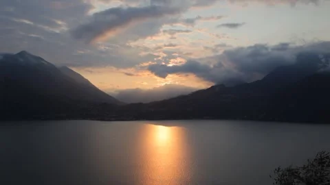 Lake Como at sunset with clouds moving in sky Stock Footage 259390218