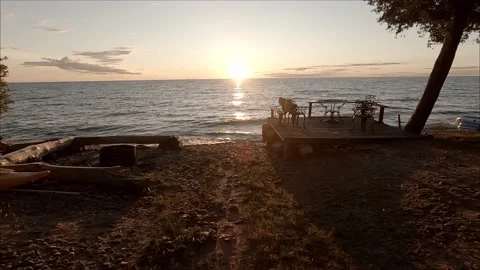 Lake cottage sunset no sound Stock Footage