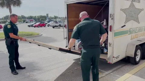 Lake County Sheriff's Office Spreads Holiday Cheer with Angel Tree Program,... Stock-Footage 258134867