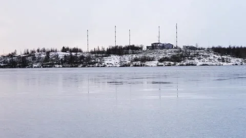 The lake, covered with the first ice, Stock Footage 328809348