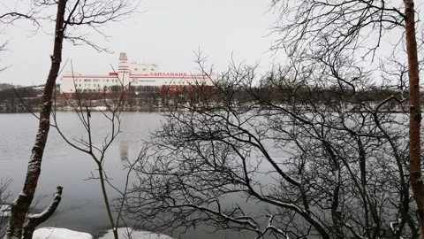 A lake covered with the first ice at sunset in early winter. Stock Footage 328809793
