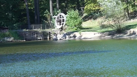 Lake with a dam and a mill Stock Footage 138348430