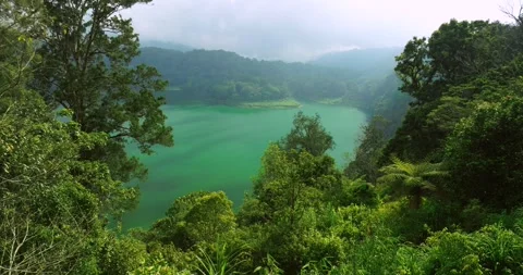 Lake Danau Buyan in Mountains of Bali, Indonesia. Hills of north Bali Stock Footage 258772983