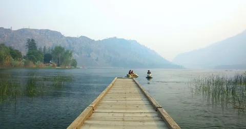 Lake dock on the camp site Stock Footage 93981933